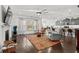 Bright living room features hardwood floors, fireplace, and open concept layout at 417 San Benito Ct., Longs, SC 29568