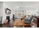 Spacious living room with hardwood floors and fireplace at 417 San Benito Ct., Longs, SC 29568