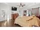 Main bedroom with king-size bed and access to backyard at 417 San Benito Ct., Longs, SC 29568