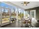 Spacious screened porch provides outdoor dining area and backyard access at 417 San Benito Ct., Longs, SC 29568