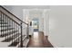 Elegant staircase with wrought-iron railing at 417 San Benito Ct., Longs, SC 29568