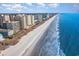 Aerial view of beachfront property with oceanfront access and high rise buildings at 501 S Ocean Blvd. # 304, North Myrtle Beach, SC 29582
