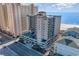 Aerial view of The Verandas, a beachfront building with parking at 501 S Ocean Blvd. # 304, North Myrtle Beach, SC 29582