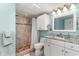 Clean bathroom with granite vanity, tile shower, and neutral decor at 501 S Ocean Blvd. # 304, North Myrtle Beach, SC 29582