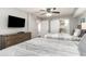 Bedroom with two twin beds and barn door to bathroom at 501 S Ocean Blvd. # 304, North Myrtle Beach, SC 29582