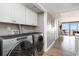 Laundry room with side-by-side washer and dryer at 501 S Ocean Blvd. # 304, North Myrtle Beach, SC 29582