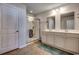 Double vanity bathroom with a large shower at 575 Mossbank Loop, Longs, SC 29568