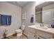 Clean bathroom with toilet, vanity, and shower at 575 Mossbank Loop, Longs, SC 29568