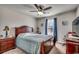 Main bedroom with a wooden bed frame and plenty of room at 575 Mossbank Loop, Longs, SC 29568