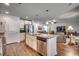 Modern kitchen with granite countertops and stainless steel appliances at 575 Mossbank Loop, Longs, SC 29568