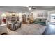 Open living space with hardwood floors and access to the kitchen at 575 Mossbank Loop, Longs, SC 29568