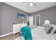 Well-lit bedroom with ceiling fan and white dresser at 612 River Oaks Dr. # 55-C, Myrtle Beach, SC 29579