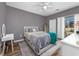 Spacious bedroom with access to a patio and plenty of natural light at 612 River Oaks Dr. # 55-C, Myrtle Beach, SC 29579