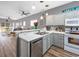Modern kitchen with stainless steel appliances and light gray cabinets at 612 River Oaks Dr. # 55-C, Myrtle Beach, SC 29579
