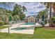 Community pool and hot tub with lounge chairs and umbrellas at 612 River Oaks Dr. # 55-C, Myrtle Beach, SC 29579