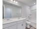 A full bathroom with double sinks, white cabinets, and a shower-tub at 808 St. Albans Loop, Conway, SC 29526