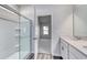 Bathroom featuring shower with glass doors and double vanity at 808 St. Albans Loop, Conway, SC 29526
