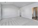 Spacious bedroom featuring vaulted ceilings, neutral carpet, and two doors at 808 St. Albans Loop, Conway, SC 29526