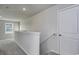 Upstairs hallway area leading to bedrooms with carpeted flooring at 808 St. Albans Loop, Conway, SC 29526