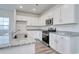 Well-equipped kitchen with stainless steel appliances and granite countertops for cooking enjoyment at 808 St. Albans Loop, Conway, SC 29526