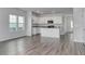 Open-concept living room and kitchen space, ideal for entertaining Gathering and friends at 808 St. Albans Loop, Conway, SC 29526