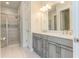 Elegant bathroom with double vanity and a walk-in shower at 8091 Laurel Ash Ave., Myrtle Beach, SC 29572