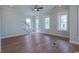 Bright living room with hardwood floors and neutral walls at 8091 Laurel Ash Ave., Myrtle Beach, SC 29572
