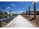 Walkway along pond with homes in background at 8091 Laurel Ash Ave., Myrtle Beach, SC 29572
