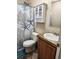 Clean bathroom with shower/tub combo and updated vanity at 818 Wayne St., North Myrtle Beach, SC 29582