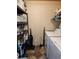 Functional laundry room with washer, dryer, and storage shelves at 818 Wayne St., North Myrtle Beach, SC 29582