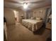 Spacious main bedroom with king-size bed and ensuite bathroom at 818 Wayne St., North Myrtle Beach, SC 29582