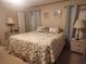 Main bedroom with king-size bed and coastal decor at 818 Wayne St., North Myrtle Beach, SC 29582