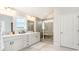 Elegant bathroom with double vanity and large walk-in shower at 834 Ireland Dr., Longs, SC 29568