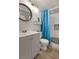 Bathroom with shower/tub combo, gray vanity, and white subway tiles at 9520 Shore Dr. # 3B, Myrtle Beach, SC 29572