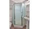 Small bathroom with corner shower and pedestal sink at 9520 Shore Dr. # 3B, Myrtle Beach, SC 29572