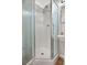 Small bathroom with corner shower and pedestal sink at 9520 Shore Dr. # 3B, Myrtle Beach, SC 29572