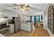 Open kitchen with stainless steel appliances and granite countertops at 9520 Shore Dr. # 3B, Myrtle Beach, SC 29572