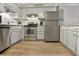 Well-equipped kitchen boasting stainless steel appliances and light wood floors at 9520 Shore Dr. # 3B, Myrtle Beach, SC 29572