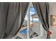 Partial ocean view and community pool from bedroom window at 9520 Shore Dr. # 3B, Myrtle Beach, SC 29572
