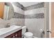 Bathroom showcasing tiled walls, a modern vanity, and sleek fixtures at 1012 N Waccamaw Dr. # 203, Murrells Inlet, SC 29576