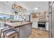 Well-appointed kitchen with island, modern appliances, and stylish backsplash at 1012 N Waccamaw Dr. # 203, Murrells Inlet, SC 29576