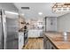 Updated kitchen featuring stainless steel appliances, stylish backsplash, and modern fixtures at 1012 N Waccamaw Dr. # 203, Murrells Inlet, SC 29576