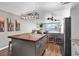 Open kitchen layout with island, ocean views, and modern finishes at 1012 N Waccamaw Dr. # 203, Murrells Inlet, SC 29576