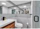 Updated bathroom featuring a modern vanity, subway tile backsplash, and glass enclosed shower at 1012 N Waccamaw Dr. # 204, Murrells Inlet, SC 29576