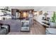 Modern kitchen with stainless steel appliances and a unique brick backsplash design at 1012 N Waccamaw Dr. # 204, Murrells Inlet, SC 29576