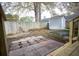 Backyard featuring a wooden fence, storage shed, and patio area with stone pavers, perfect for outdoor enjoyment at 104 Willow Ridge Rd., Myrtle Beach, SC 29588