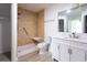 Modern bathroom with step-in shower, safety bars, and stylish white vanity at 104 Willow Ridge Rd., Myrtle Beach, SC 29588