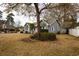 Charming single-Gathering home with gray siding and a well-manicured front yard at 104 Willow Ridge Rd., Myrtle Beach, SC 29588
