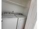 Convenient laundry area includes Whirlpool washer and dryer, plus storage shelf at 104 Willow Ridge Rd., Myrtle Beach, SC 29588