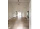 Inviting living space with wood flooring and vaulted ceiling, offering a seamless flow to other rooms at 104 Willow Ridge Rd., Myrtle Beach, SC 29588